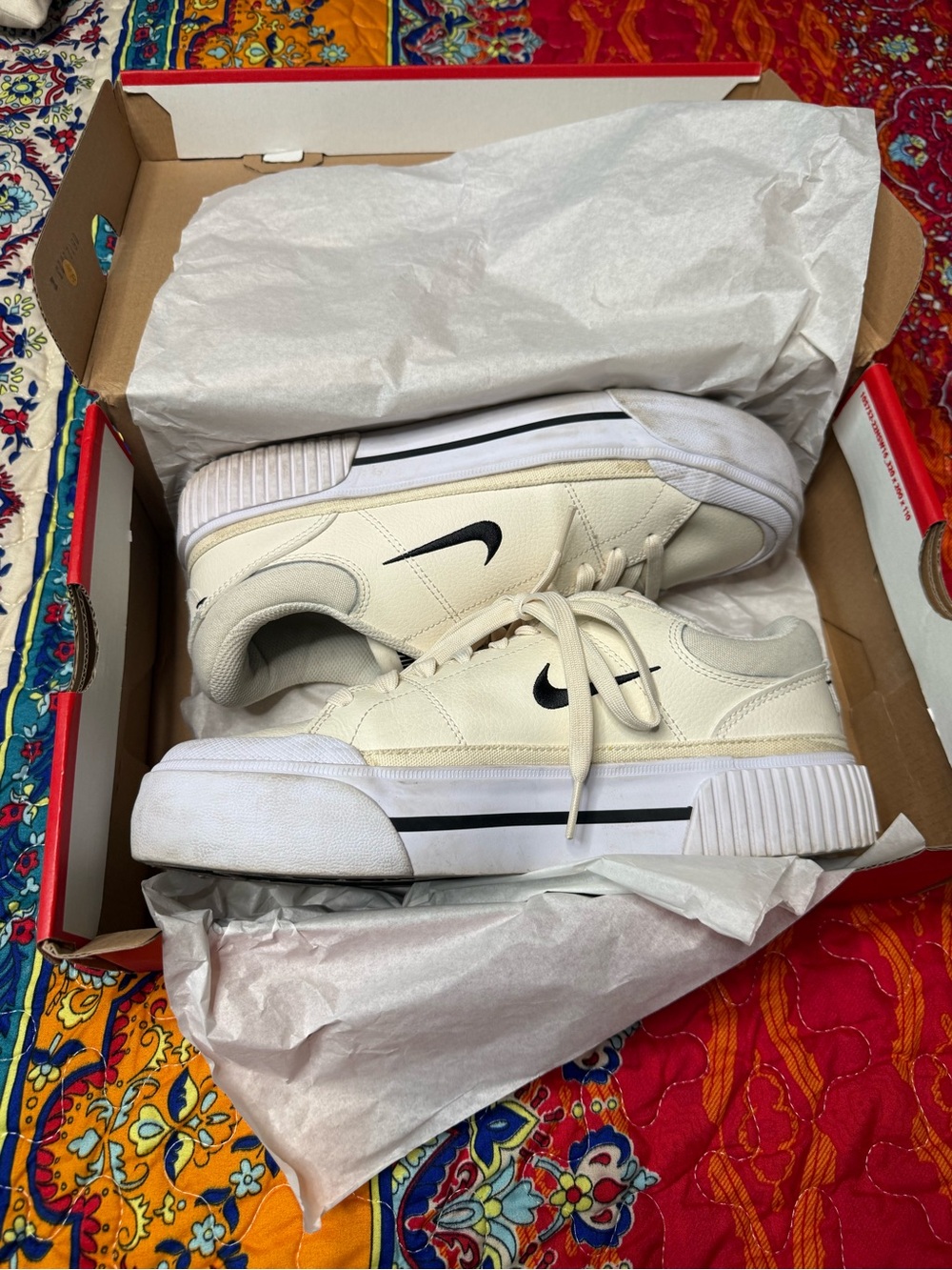 Nike Cream Low-Top Sneakers with Black Swoosh